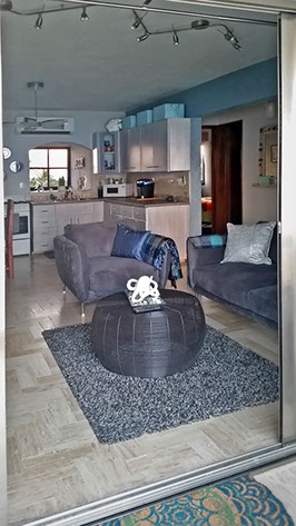 Isla Mujeres vacation rentals,&nbsp; sailfish condo #402 looking in from balcony